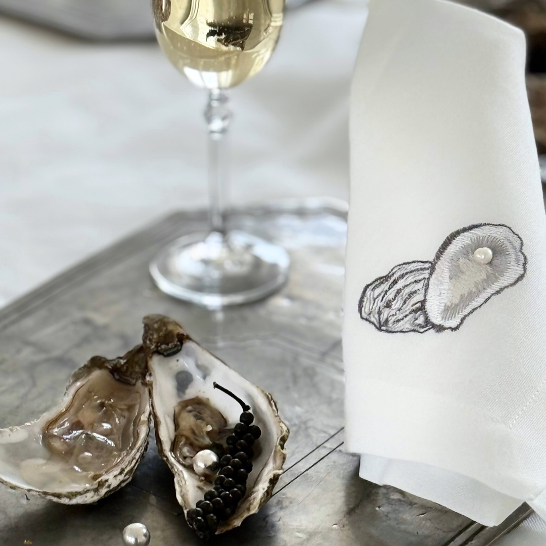 Serviet med østers og perle