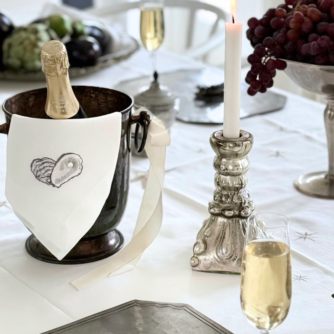 Serviet med østers og perle