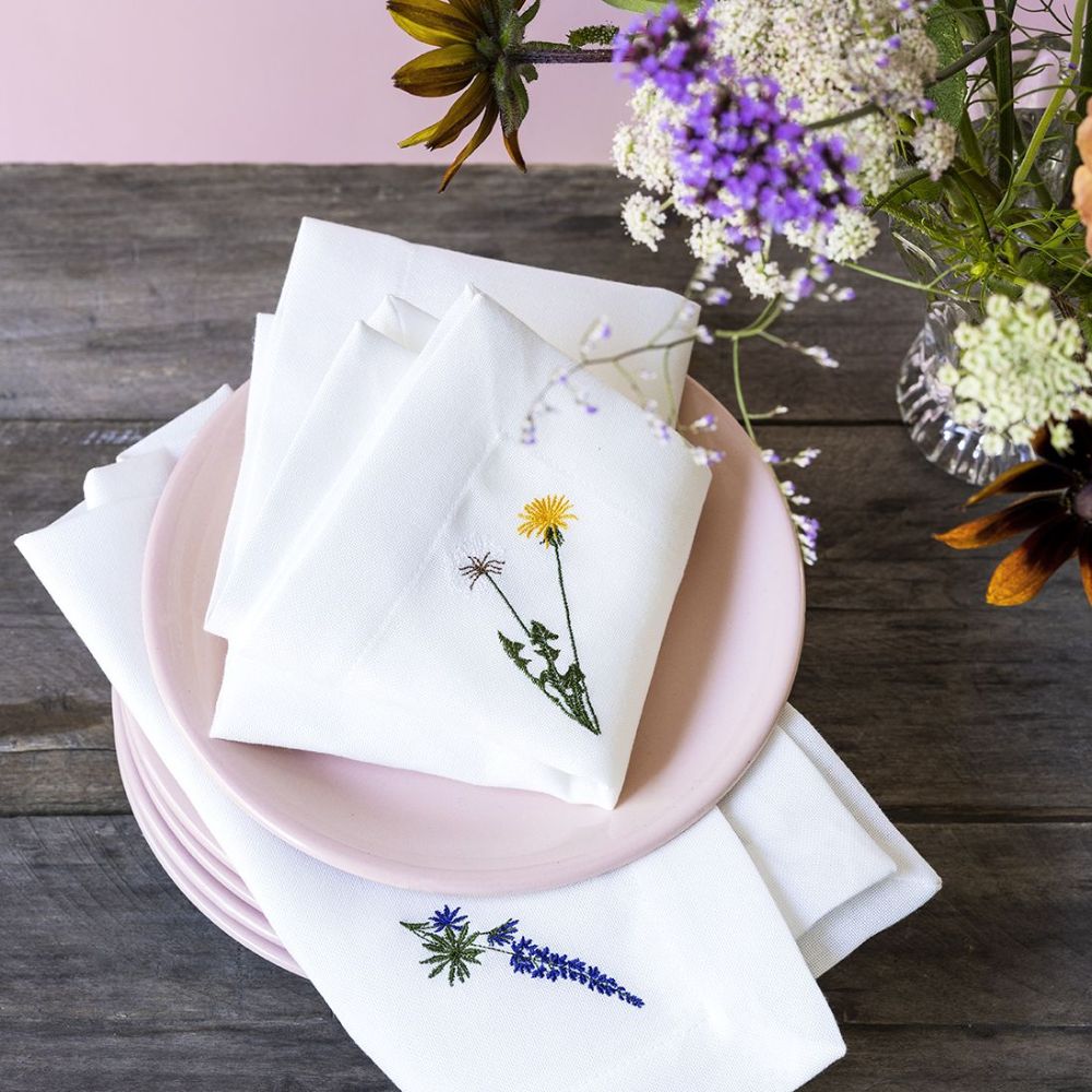 Flora serviet med mælkebøtte